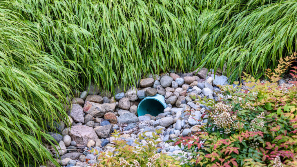 stormwater management pipe in rocks