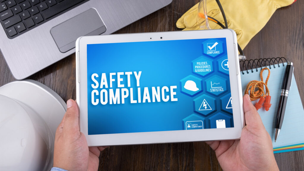 safety compliance on tablet that is being held